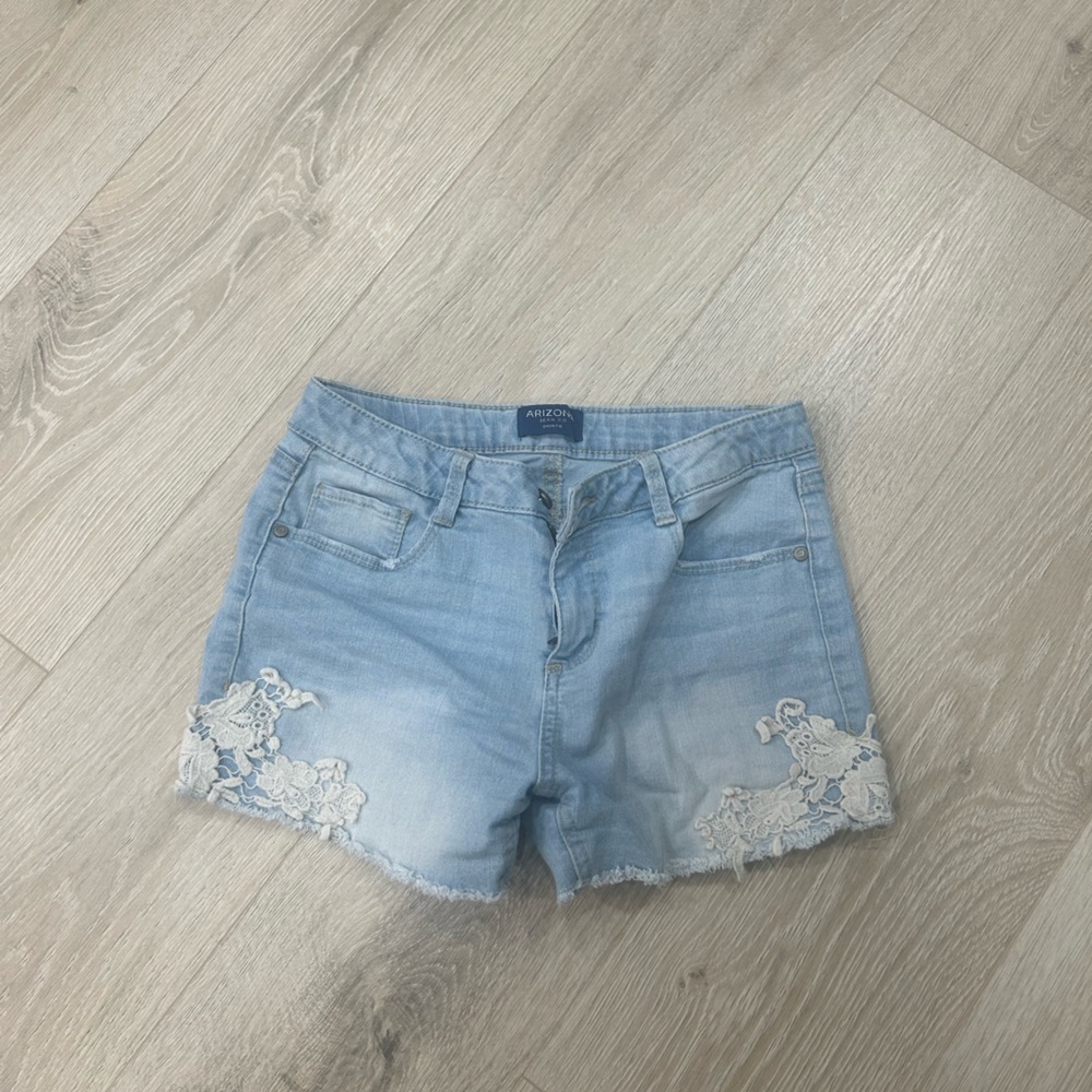 Light wash shorts with floral lace
